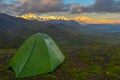 Sunrise View Of Mount Denali - Mt Mckinley Peak With Alpenglow During Golden Hour With Green Camping Tent In The