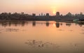 Sunrise view of popular tourist attraction ancient temple complex Angkor Wat with reflected in lake Siem Reap, Cambodia Royalty Free Stock Photo