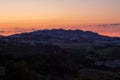 Sunrise View from the village of Cossignano over the hills to the village of Ripatransone in Italy Royalty Free Stock Photo