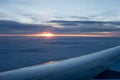 Sunrise viewed from the plane Royalty Free Stock Photo