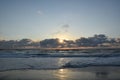 Sunrise on  Vilano Beach Florida with waves crashing on the shore. Royalty Free Stock Photo