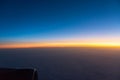 Sunrise from the window of the plane Royalty Free Stock Photo