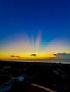 Sunrise winter city Sundays clouds beach ships ocean blue orange Royalty Free Stock Photo
