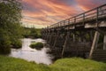 Sunrise at a Wooden Bridge, Highlands, Scotland, UK. Royalty Free Stock Photo