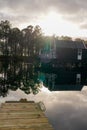 Sunrise on wooden pontoon lake in Marina of Talaris in Lacanau village