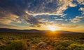 Sunrise in yellow and blue colors over the Tankwa Karoo veld in South Africa.