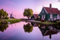 Sunrise Zaanse Schand Dutch windmill village, Windmill village Zaanse Schans, green wooden house at the windmill village