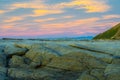 Sunrises Colorfully Over Kaikoura White Mud-stone Rock Ledges