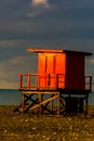 The sunrises lighting the small wooden house on the beach in Bat