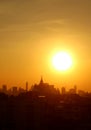 Sunrising Over Bangkok City Skyline with the Silhouette of Iconic Landmark, Phu Khao Thong Golden Mount Chedi