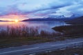 Sunrising over Torne trÃÂ¤sk and U-shaped mountain named Lapporten Royalty Free Stock Photo