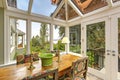 Sunroom patio area with dining table set