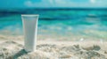 Sunscreen lotion tube on sandy beach, ocean in background with empty space. Summer skin protection concept, sunblock Royalty Free Stock Photo