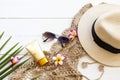 Sunscreen spf50  cosmetics health care for skin face with crochet ,flowers frangipani ,sunglasses ,hat and coconut leaf of lifesty Royalty Free Stock Photo