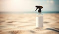 Sunscreen Spray Bottle Mockup on Beach Sand with a Clear Blue Sea Background Royalty Free Stock Photo