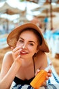 Sunscreen sunblock. Woman putting solar cream on nose smiling beautiful summer day. Skincare. Girl applying sun cream