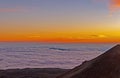 Sunset Above the Clouds in the High Mountains Royalty Free Stock Photo