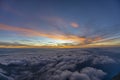 Sunset in the high mountains above the clouds Royalty Free Stock Photo