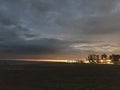 Sunset above Coney Island Boardwalk - View from Brighton Beach in Brooklyn, New York, NY.