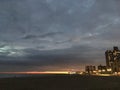 Sunset above Coney Island Boardwalk - View from Brighton Beach in Brooklyn, New York, NY.