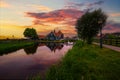 Sunset above historic farm houses in the holland village of Zaanse Schans