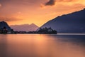 Sunset above Iseltwald peninsula and former castle in Switzerland Royalty Free Stock Photo