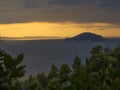 Sunset above the sea. Orange sky. Kelifos island. Greece.