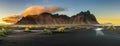 Sunset above Vestrahorn and its black sand beach in Iceland