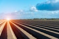 Sunset above windmills on the field Royalty Free Stock Photo