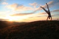 Sunset and acrobatic girl