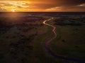 Sunset, aerial, atmospheric view on curving river Khwai, Moremi forest, Botswana. Typical ecosystem, part of Okavango delta, Royalty Free Stock Photo