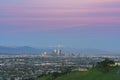 Sunset aerial view of the beautiful Los Angeles downtown cityscape with mt. Baldy Royalty Free Stock Photo