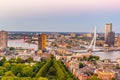 Sunset aerial view of Erasmus bridge and skyline of Rotterdam, Netherlands