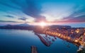 Sunset aerial view of Marina Corricella in Procida island, Italy