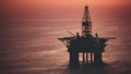 Sunset Aerial View of Offshore Oil Rig Extracting Petroleum and Natural Gas. Concept Oil and Gas