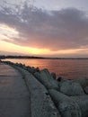 Sunset, alley near the sea