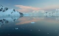 Sunset and alpenglow, mountains and mirror - calm ocean