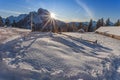 Sunset on Alpine hut in front of a beautiful winter scenery, Dolomites Royalty Free Stock Photo