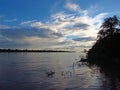 The sunset on Amazon river in Peru, South America Royalty Free Stock Photo