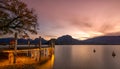 Sunset in Annecy. Red clouds and a lake in the French Alps Royalty Free Stock Photo