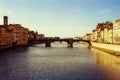 Sunset on the Arno river and bridges in Florence, shot with analogue film technique Royalty Free Stock Photo