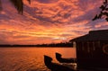 Sunset at Ashtamudi lake in Kollam, Kerala, India. Gorgeous summer time golden hour Royalty Free Stock Photo