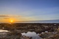 Sunset Atlantic Ocean view at Dar Bouazza beach, in Tamarist,