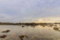 Sunset Atlantic Ocean view at Dar Bouazza rocky beach Royalty Free Stock Photo