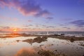 Sunset Atlantic Ocean view at Dar Bouazza rocky beach Royalty Free Stock Photo