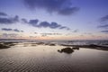 Sunset Atlantic Ocean view at Dar Bouazza rocky beach Royalty Free Stock Photo