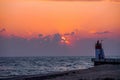 Sunset on the Atlantic ocean, view on lighthouse. Wallpapers concept