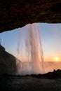 Sunset at the back of Seljalandsfoss waterfall in Iceland Royalty Free Stock Photo