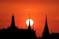 sunset back on silhouette buddhist temple red orange evening cloud Royalty Free Stock Photo