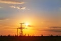 sunset on the background of power lines